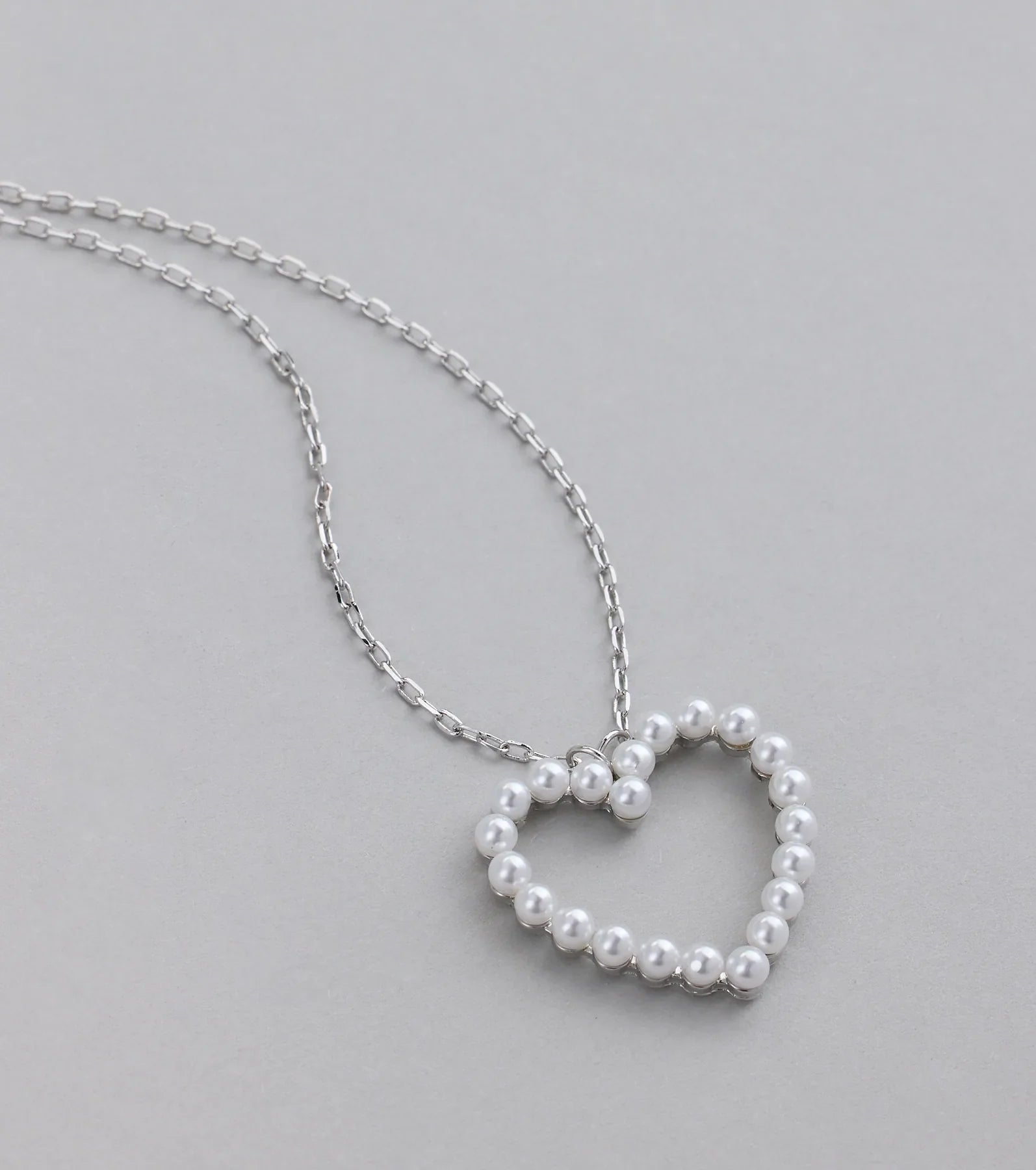 Capture Hearts Pearl Charm Necklace