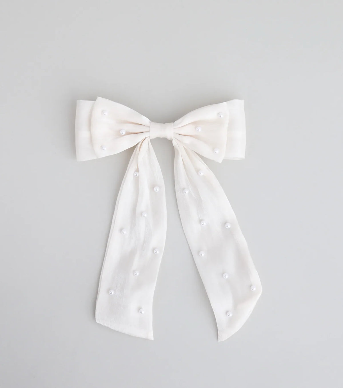 Tied With a Pearl Hair Bow