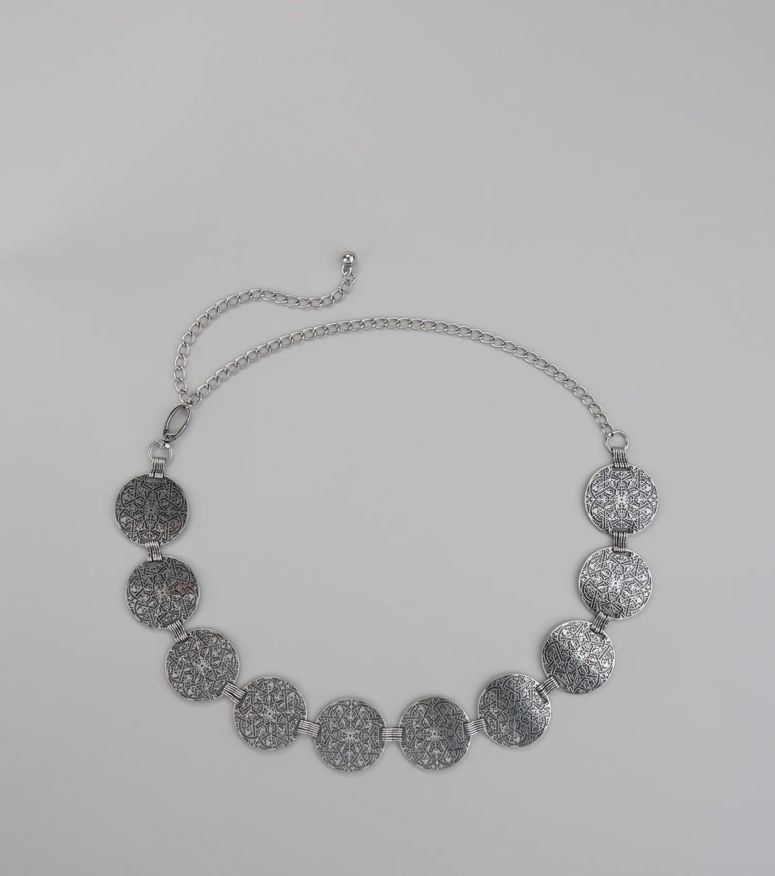 Moving Freely Medallion Chain Belt