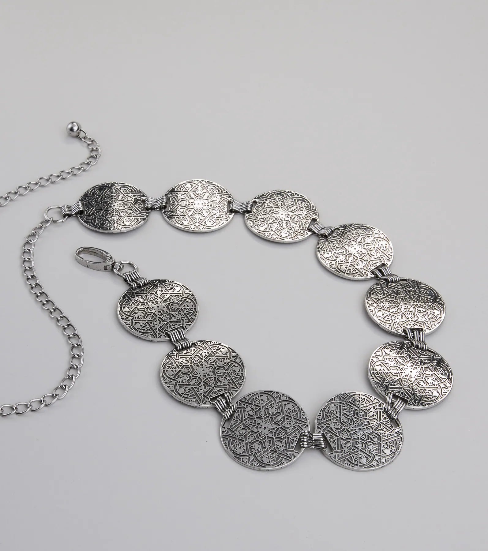 Moving Freely Medallion Chain Belt